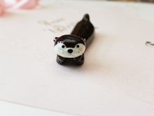 Load image into Gallery viewer, Relaxing Otter Pottery Figurine Desk decor Cutlery rest
